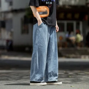 a men wear a Street Wear Style baggy jeans with one hand in pocket